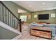 Spacious living room with modern furnishings, natural light, and seamless flow to the dining area at 1021 Vickie Ln, Matthews, NC 28104
