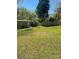 Wide backyard featuring a small seating area and ample green space, perfect for outdoor activities at 104 Poplar St, Clover, SC 29710