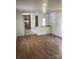 Open-concept living room with wood-look floors at 104 Poplar St, Clover, SC 29710