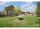 Serene backyard featuring a well-manicured lawn, patio, and a charming privacy fence at 106 Independence Ct, Kings Mountain, NC 28086