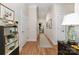 Hallway showcasing hardwood floors, neutral walls, crown molding, and decorative furnishings at 106 Independence Ct, Kings Mountain, NC 28086