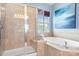 Elegant bathroom featuring a glass-enclosed shower, soaking tub, and stylish tile work at 11447 Potters Row, Cornelius, NC 28031