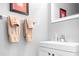 Stylish bathroom featuring a sleek vanity, modern fixtures, and elegant towels at 11447 Potters Row, Cornelius, NC 28031