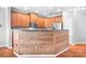 Kitchen island boasts granite countertops and modern rustic-style wood paneling at 11447 Potters Row, Cornelius, NC 28031