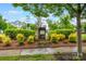 Neighborhood sign surrounded by shrubbery and landscaping at 11447 Potters Row, Cornelius, NC 28031