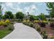 Streetscape view of the neighborhood with wide sidewalks and landscaping at 11447 Potters Row, Cornelius, NC 28031