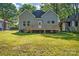 The backyard features a spacious deck, lush grass, and a well-maintained exterior at 126 Hemphill Ave, Chester, SC 29706