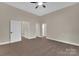 Spacious bedroom with a neutral color palette and connecting doors to other rooms at 126 Hemphill Ave, Chester, SC 29706