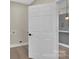 Laundry room entrance adjacent to the modern kitchen in a newly renovated home at 126 Hemphill Ave, Chester, SC 29706