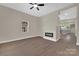 Bright living room featuring a fireplace and seamless flow into a modern kitchen at 126 Hemphill Ave, Chester, SC 29706