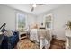 Bright bedroom features a neutral color palette, area rug, and natural light at 1327 Fairmont St, Charlotte, NC 28216