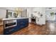 Well-appointed kitchen with stainless steel appliances, a central island, and seamless access to the dining area at 1327 Fairmont St, Charlotte, NC 28216