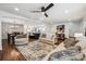 Spacious living area with seamless transition to dining and kitchen, offering modern comfort and style at 1327 Fairmont St, Charlotte, NC 28216
