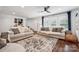 Bright living room with plush sofas, large windows, and elegant decor, creating a welcoming atmosphere at 1327 Fairmont St, Charlotte, NC 28216