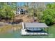 Waterfront property with private dock, boat lift and covered area for boat storage at 153 High Hills Dr, Mooresville, NC 28117