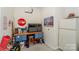 Functional garage with a workbench, tools, and extra storage space at 153 High Hills Dr, Mooresville, NC 28117