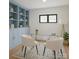 Bright office featuring modern decor, a stylish bookshelf, and a comfortable seating area at 153 High Hills Dr, Mooresville, NC 28117