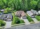 Aerial shot of a home with a manicured lawn, complemented by mature trees and a neighborhood setting at 1589 Essex Hall Dr, Rock Hill, SC 29730