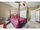 This bedroom features a four poster bed and plenty of closet space at 1589 Essex Hall Dr, Rock Hill, SC 29730