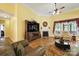 Inviting living room with a fireplace, large television, and hardwood flooring at 1589 Essex Hall Dr, Rock Hill, SC 29730