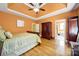 This spacious main bedroom features hardwood floors, tray ceiling, and an attached main bathroom at 1589 Essex Hall Dr, Rock Hill, SC 29730