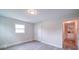 Bedroom with a window, access to other rooms, and wood-look flooring at 163 Briarcliff Dr, Kannapolis, NC 28081