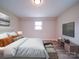 Relaxing bedroom boasts a large bed, soft textures and mounted television at 163 Briarcliff Dr, Kannapolis, NC 28081