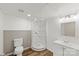 Full bathroom featuring a shower, toilet, and vanity with modern fixtures at 173 8Th Ave, Conover, NC 28613