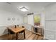 Cozy dining area with a wooden table, stylish seating, and bright natural light from the backyard at 173 8Th Ave, Conover, NC 28613