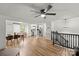 Open-concept design: dining to kitchen and a glimpse of the living room with modern luxury vinyl flooring at 173 8Th Ave, Conover, NC 28613