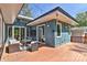 Inviting outdoor deck area, featuring cozy seating, stylish decor, and string lights for a relaxing ambiance at 1900 Lakedell Dr, Charlotte, NC 28215