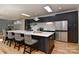 Modern kitchen with a large island and stool seating, perfect for entertaining at 1900 Lakedell Dr, Charlotte, NC 28215