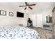 Inviting bedroom with a comfortable bed, ceiling fan, and neutral color palette at 201 Olde Coach Ln, Crouse, NC 28033