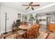 Cozy dining room with a ceiling fan and lots of natural light at 201 Olde Coach Ln, Crouse, NC 28033