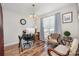 Well-lit home office with a modern desk and comfortable seating arrangement at 201 Olde Coach Ln, Crouse, NC 28033