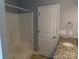 Bathroom featuring walk-in shower and granite vanity with modern sink and fixtures at 2127 Cedar Rd, York, SC 29745
