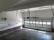Spacious two car garage features an automatic overhead door and interior lighting at 2127 Cedar Rd, York, SC 29745