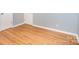 Bedroom features hardwood flooring and neutral paint at 2218 W Fifth Ave, Gastonia, NC 28052
