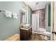 Bathroom features a vessel sink, granite counters, and a shower/tub combo with tiled walls at 2599 Highway 557 None, Clover, SC 29710
