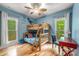 Cozy bedroom featuring bunk beds, a ceiling fan, and a desk creating a playful and functional space at 2599 Highway 557 None, Clover, SC 29710