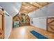 Finished attic or bonus room with wood ceiling, accent wall, and cozy natural light at 2599 Highway 557 None, Clover, SC 29710