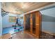 Bright workout room with sauna, exercise equipment, blue floor pads, and wood paneled ceiling at 2599 Highway 557 None, Clover, SC 29710