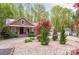 Charming home with a red metal roof, landscaped front yard, and a circular driveway at 2599 Highway 557 None, Clover, SC 29710