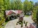 Beautiful home with a circular driveway, well maintained landscaping, and a spacious three car garage at 2599 Highway 557 None, Clover, SC 29710