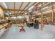Bright and airy garage interior with exposed beams, car lift, workbench and plenty of storage space at 2599 Highway 557 None, Clover, SC 29710