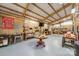 Spacious garage interior with workbench, shelving, overhead lighting and lots of workspace at 2599 Highway 557 None, Clover, SC 29710