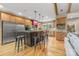 Open kitchen with a rustic island, stainless steel appliances, and access to the living area at 2599 Highway 557 None, Clover, SC 29710