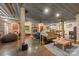Open concept living room featuring a wood burning fireplace, concrete floors, and exposed ductwork at 2599 Highway 557 None, Clover, SC 29710
