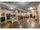 Open concept living space featuring concrete floors, fireplace, and exposed HVAC at 2599 Highway 557 None, Clover, SC 29710
