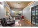 A comfortable home office featuring a built-in desk, wood floors, and ample natural light at 2599 Highway 557 None, Clover, SC 29710